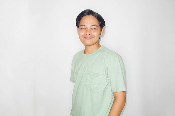 istock an Indonesian man is taking a selfie with a random expression and style, self potrait 2209685303