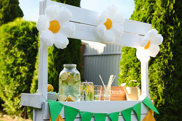 istock Lemonade stand with refreshing drink in park 2209685788