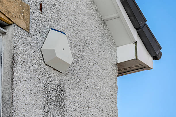 istock White Burglar Home Security Alarm Siren Box on External House Wall 2209691081