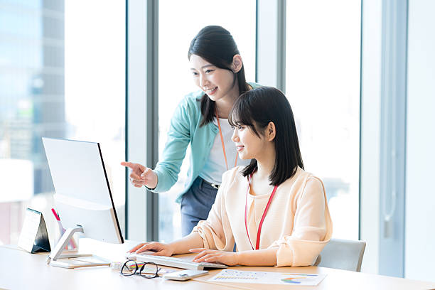 istock business woman working in the office 2209693429