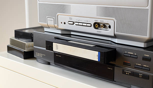 istock An old TV with a VCR on the table.90s. 2209694377
