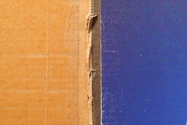 istock Old textured cardboard surfaces showing various colours and patterns. 2209694401
