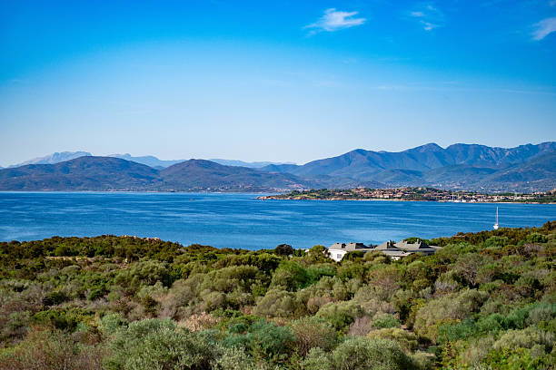 A panoramic view of the sea of ​​the town of San Teodoro, in Sardinia, the sun is shining and the sky is blue, concept of relaxation in nature and beauty