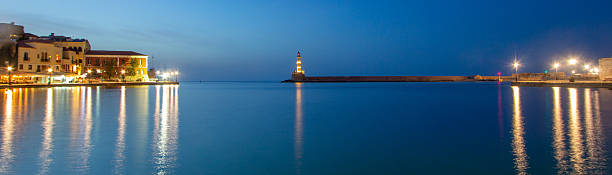 Rethymnon, Crete, Greece - Sept 18, 2021: View of the lighthouse in the Old Venetian Harbor  of Rethymnon. Crete, Greece