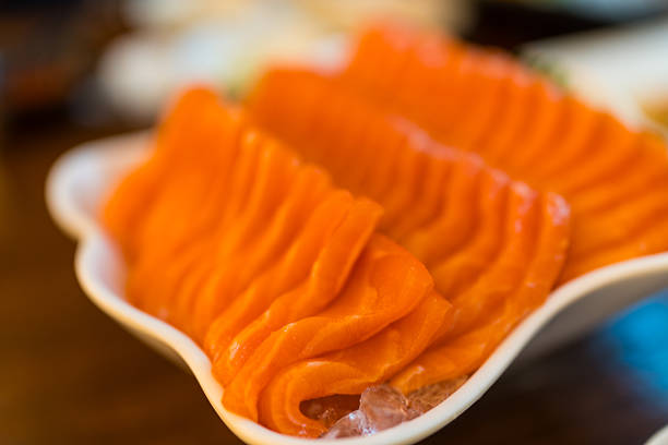Sliced salmon sashimi, Japanese raw food delicious menu, famous fish from Norway