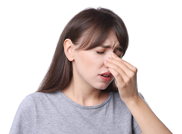 istock Woman suffering from sinusitis on white background 2209698113