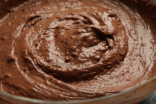 istock Fresh chocolate dough in bowl, closeup view 2209699730