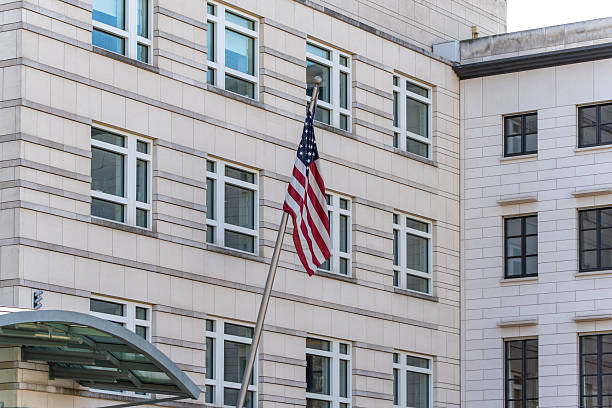 istock A large building with a flagpole and a flag on it 2209705141