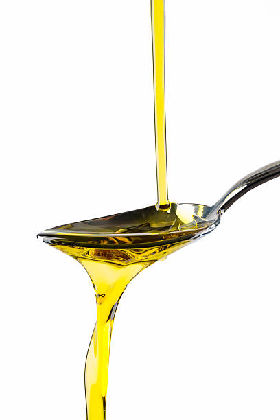 istock Organic olive oil on white background 2209711099