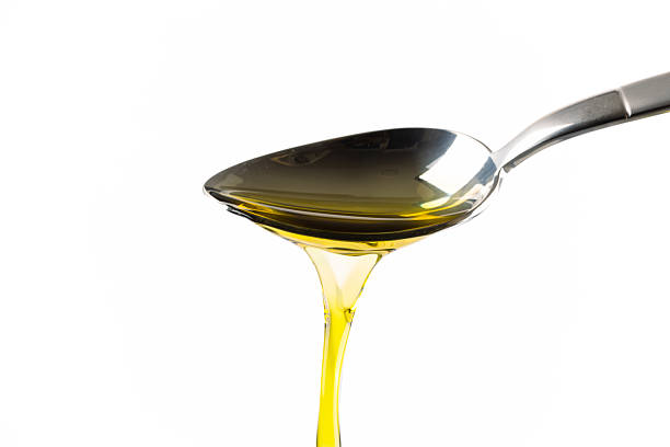 istock Organic olive oil on white background 2209711154