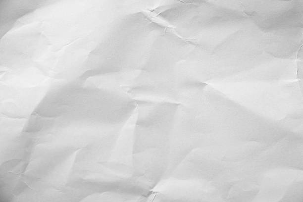 istock Crumpled paper texture crease natural background authenticity imperfection white sheet smooth matte paper unmarked symbolizing purity minimalism plain surface Paper art highlights organic fibers grain 2209716153