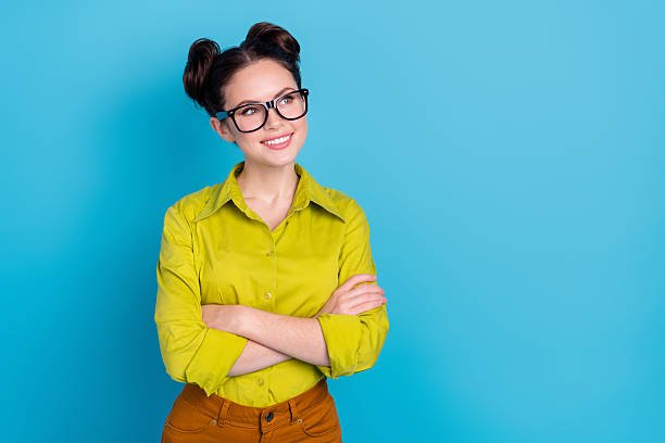 istock Photo of creative minded lady representative cross arms look empty space working ads isolated blue color background 2209723640