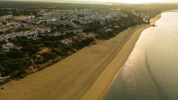 istock Coastal town at sunset in Punta Umbria, Spain 2209724415