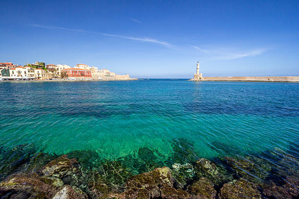 Chania Harbour, on Crete’s northwest coast, was built by the Venetians between 1320 and 1356 as a fortified naval base. It features a series of shipyard buildings (arsenali) used for maintaining galleys and a lighthouse originally constructed by the Venetians and later rebuilt by the Egyptians in the 19th century. The harbour served military and commercial functions through Venetian, Ottoman, and modern Greek periods.