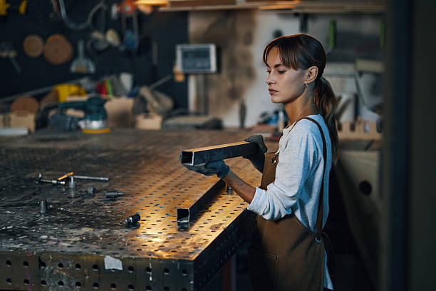 istock Worker Working With Metal Details In Factory 2209730938