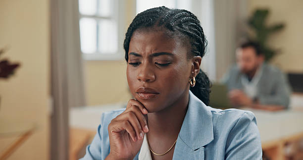 istock Business, thinking and woman in office, decision and problem solving with pressure. Person, employee and investigative journalist in workplace, choice or thoughtful with wonder, confused or questions 2209733452