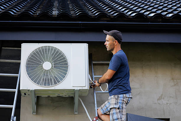 istock A man is working on an air conditioner 2209742117