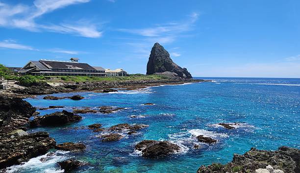istock Coastal landscape with rocky shore and blue waters. 2209743293