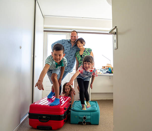 istock Family Packing at Home 2209746454