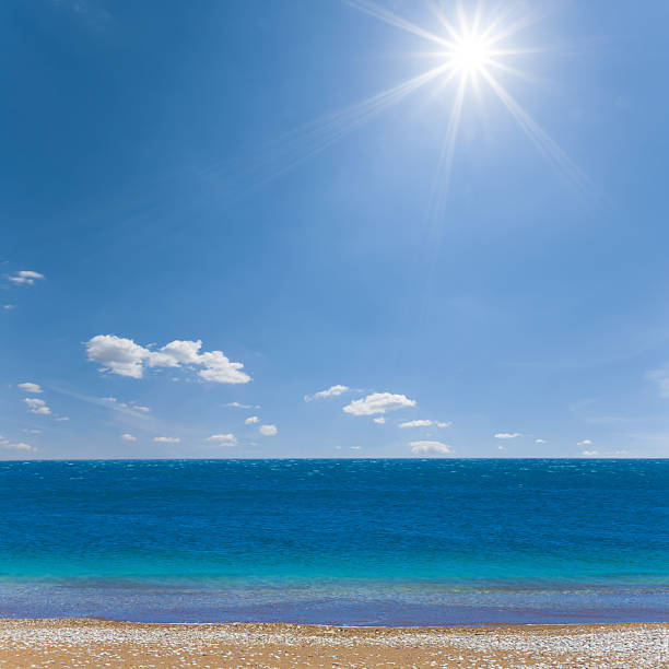 istock emerald sea bay with sandy beach under a sparkle sun 2209748823