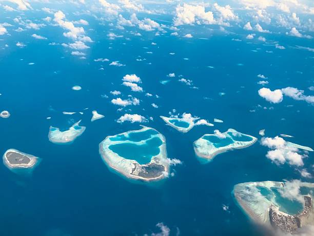 istock Atolls in the Maldives aerial view 2209749901