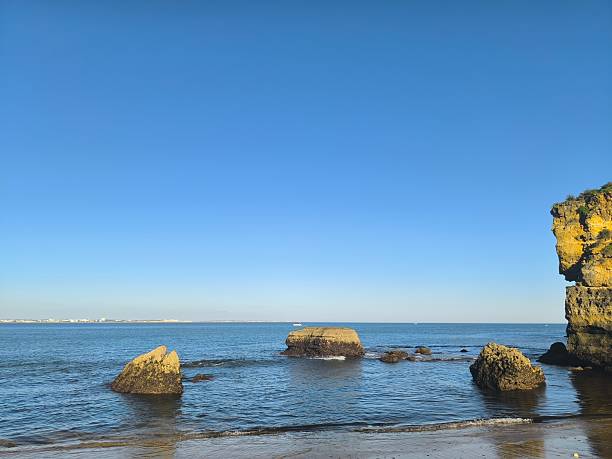istock Lonely Rock in Calm Waters 2209751066