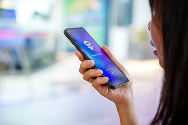 istock Woman using voice-based AI assistant on smartphone 2209751393