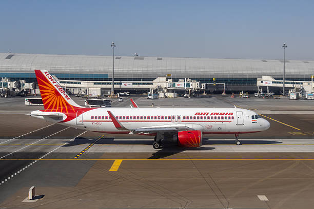 Dubai, United Arab Emirates - April 4, 2025 : Air India Airbus A320neo aircraft at Dubai International Airport in Dubai, United Arab Emirates.