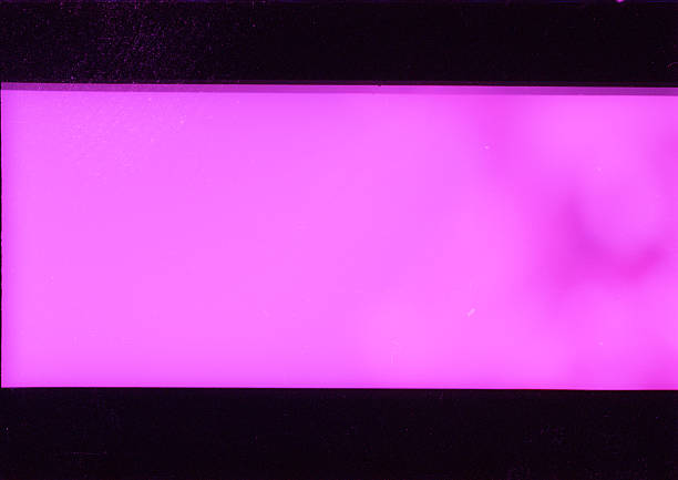 Blank grained film strip texture background with heavy grain, dust and fingerprints