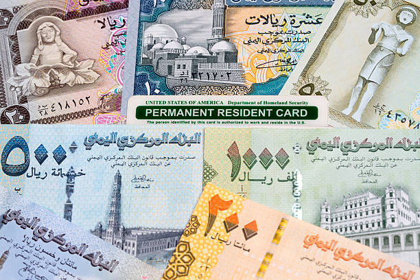 istock American permanent resident card on a Yemeni Rial 2209761667