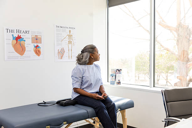 istock Mature Woman Waiting for Appointment in Doctor's Office 2209762733