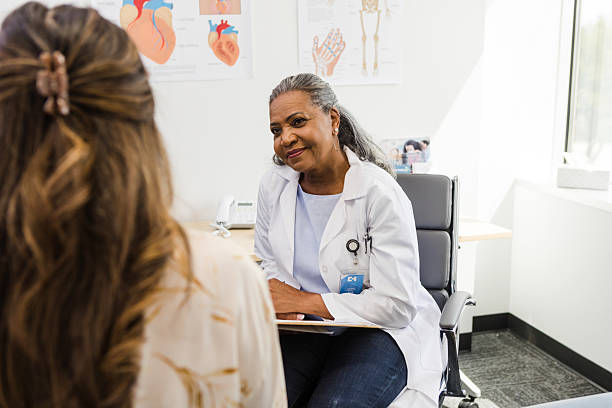 istock Doctor and Patient Talking in Medical Office 2209763411