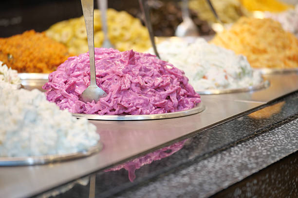 Colorful salad dishes beautifully displayed in a buffet for all to enjoy