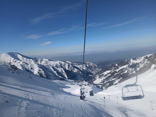 istock Almaty, cable car ride over snow-capped mountains 2209766336