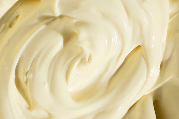 istock Abstract Food Background. Swirled Mayonnaise Spread 2209770888