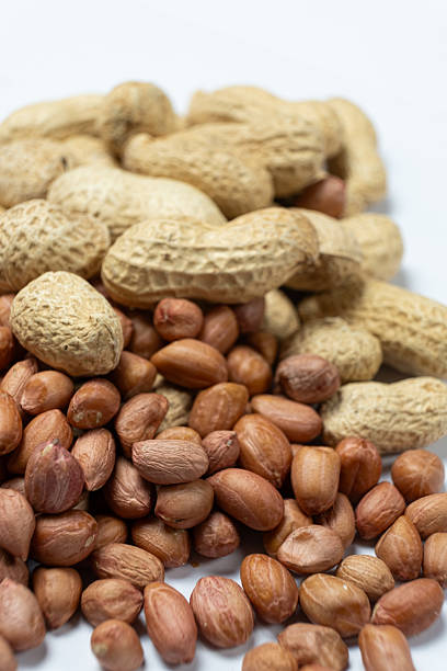 istock Shelled and Unshelled Peanuts Close-Up 2209771053