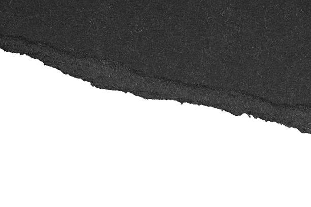 istock torn or ripped black paper sheet isolated on white 2209776638
