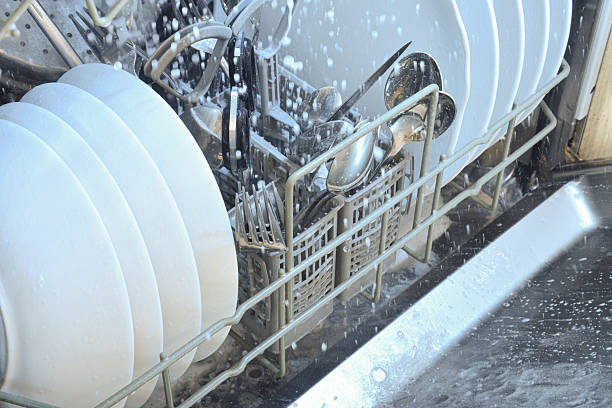 istock Full dishwasher still running when the door is opened 2209777332