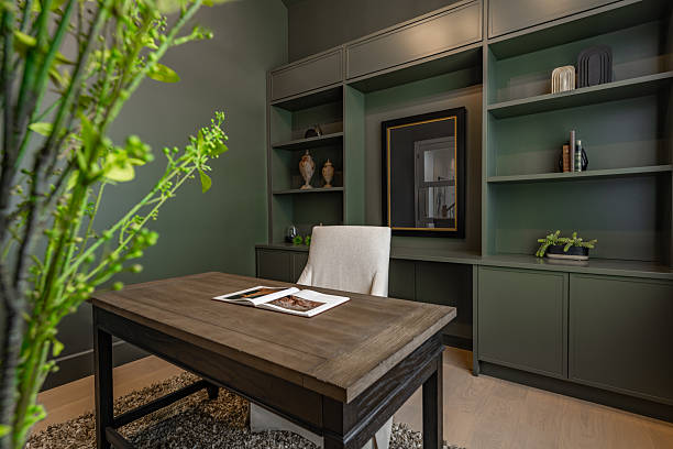 istock Home office interior with dark green paint 2209779846