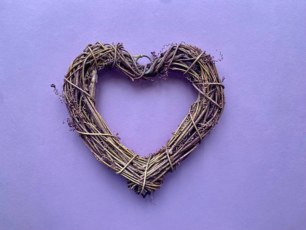Grapevine heart  on a grey background. Closeup