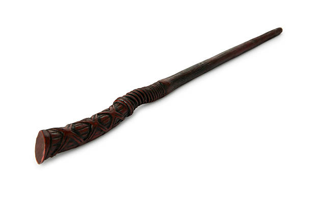istock One wooden magic wand isolated on white 2209789438