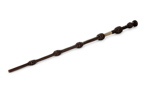 istock One wooden magic wand isolated on white 2209789456