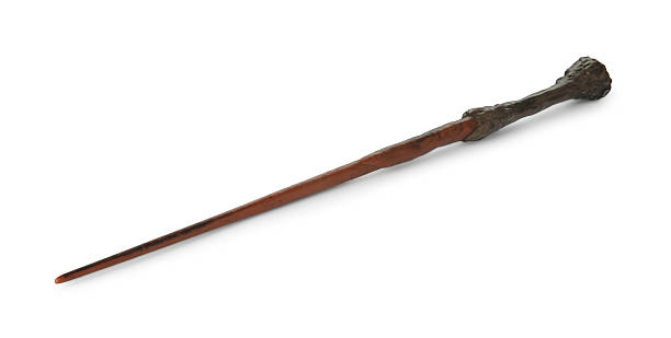 istock One wooden magic wand isolated on white 2209789491