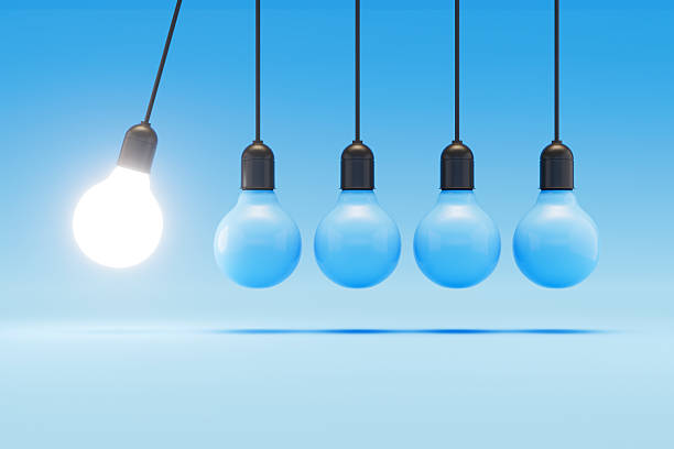 istock Newton’s Cradle with Lightbulbs, Ideas, Teamwork and Leadership Concept 2209789706