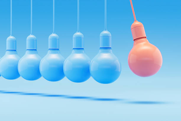 istock Newton’s Cradle with Lightbulbs, Ideas, Teamwork and Leadership Concept 2209789750