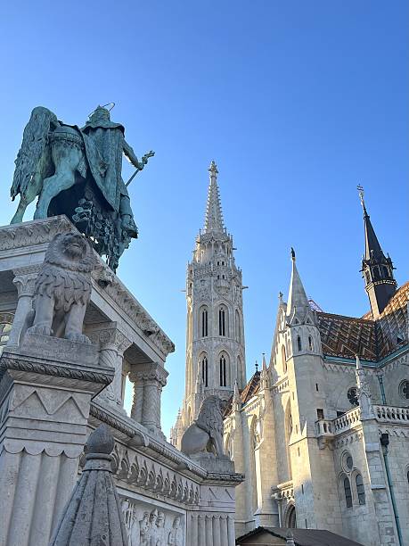 Budapest, Hungary - December 1, 2019: St. Stephen Statue - Szent István lovasszobra from below against the Sky. St. Stephen Statue on Castle Hill close to Matthias Church and Fisherman's Bastion in district of Buda in Budapest. The equestrian bronze statue was erected in the year1906. Castle Hill, Fisherman's Bastion, Budapest, Hungary, Eastern Europe