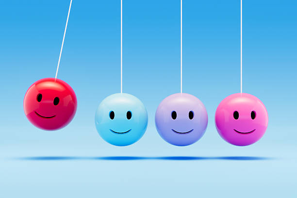 istock Newton’s Cradle with Smiley Face Emoji, Teamwork and Leadership Concept 2209790182