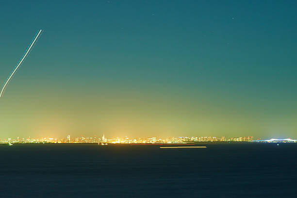 istock Under the emerald sky, the lights never sleep. 2209794492