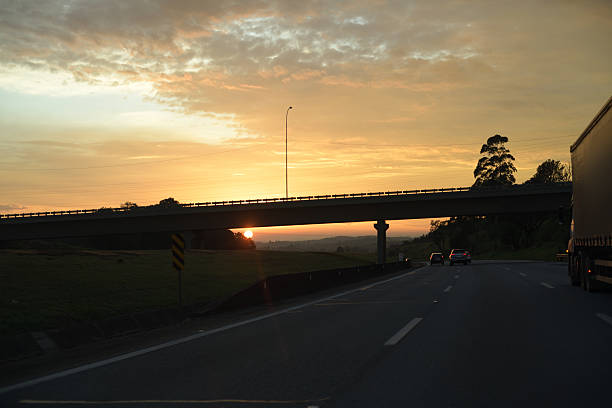 sun rising on the road