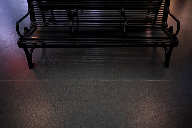Black metal benches for resting in the mall